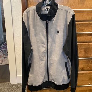 Travis Mathew Black and Gray zip-up. No tags, excellent condition